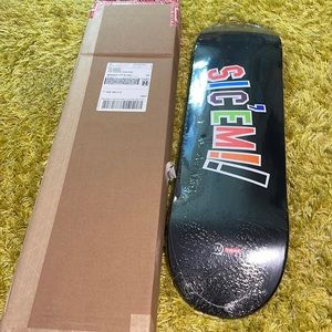Supreme skate board! Still in plastic